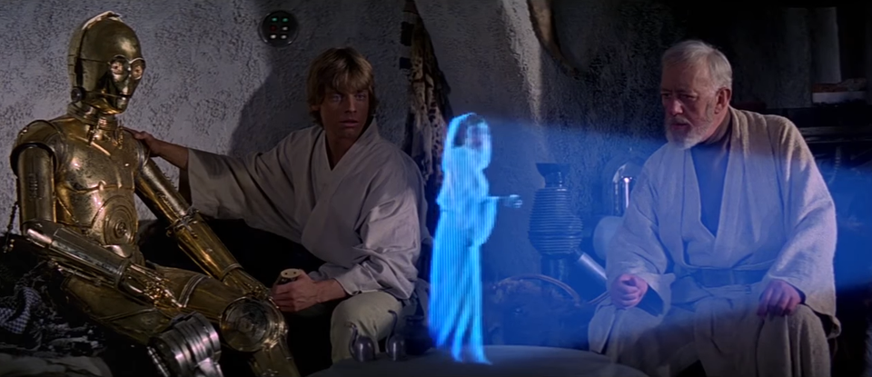 capture d'écran d'une des utilisations les plus connues d'hologrammes sur grand écran dans le premier film Star Wars en 1977